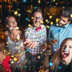 depositphotos_184221834-stock-photo-group-people-having-party-roof